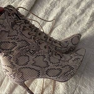 Tan snake print heeled booties